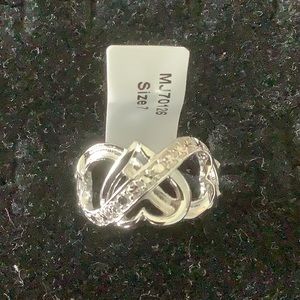 Ladies size 7 sterling silver and .10 diamonds ring.